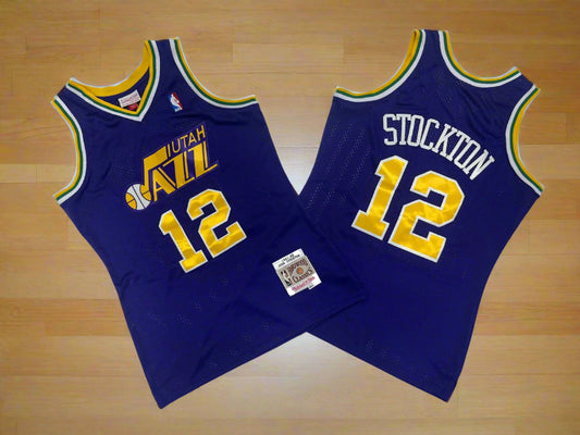 Blue basketball jersey with yellow and white text on a white background