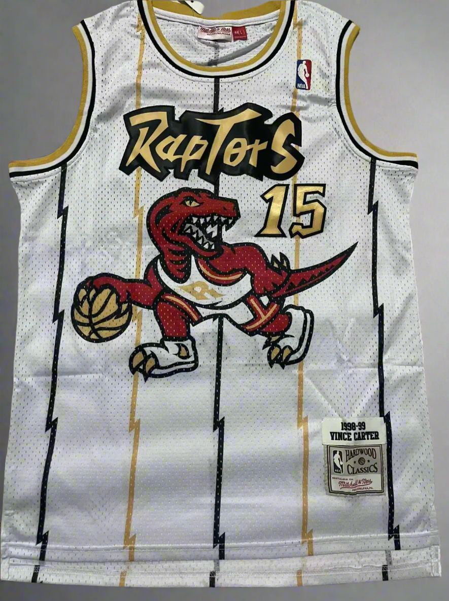 Basketball jersey with Raptors logo and number 15 on a white background