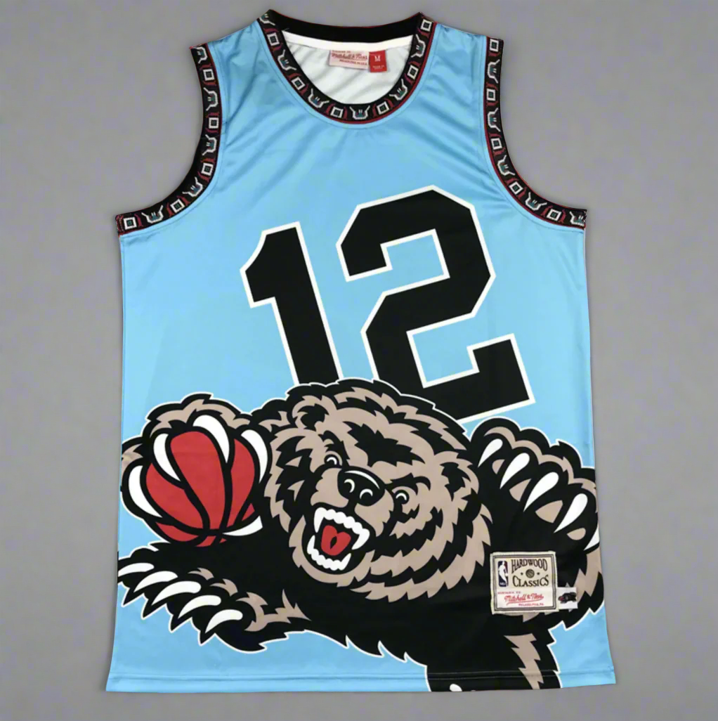 Light blue basketball jersey with bear graphic and number 12 