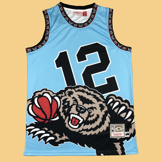 Light blue basketball jersey with bear graphic and number 12 