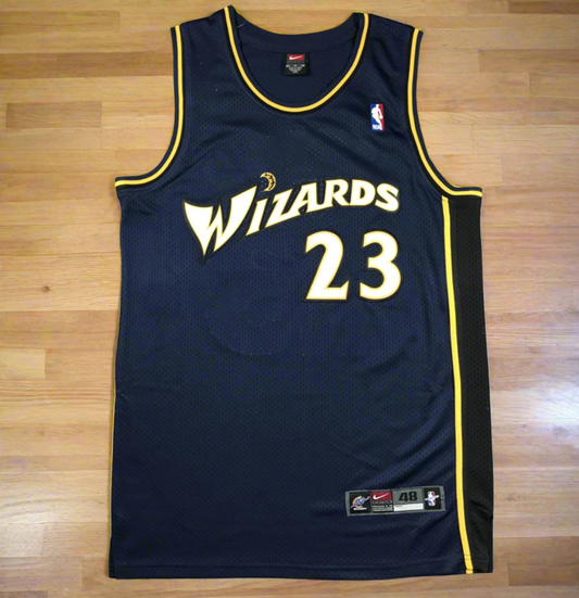 Navy blue basketball jersey with 'Wizards' and number '23' on a gray background